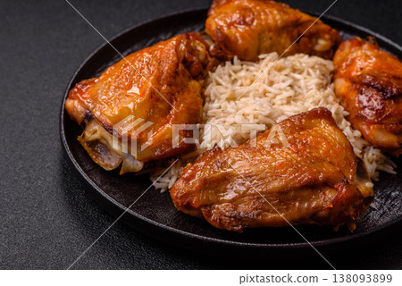 Kabsa or haneeth, an Arabic dish with rice and chicken, salt, and spices. Kabsa or haneeth 138093899
