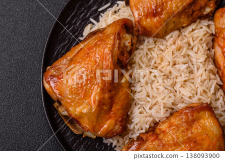 Kabsa or haneeth, an Arabic dish with rice and chicken, salt, and spices. Kabsa or haneeth Kabsa or haneeth, an Arabic dish with rice and chicken, salt, and spices. Kabsa or haneeth 138093900