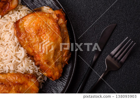 Kabsa or haneeth, an Arabic dish with rice and chicken, salt, and spices. Kabsa or haneeth Kabsa or haneeth, an Arabic dish with rice and chicken, salt, and spices. Kabsa or haneeth 138093903