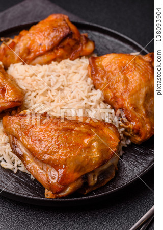 Kabsa or haneeth, an Arabic dish with rice and chicken, salt, and spices. Kabsa or haneeth Kabsa or haneeth, an Arabic dish with rice and chicken, salt, and spices. Kabsa or haneeth 138093904