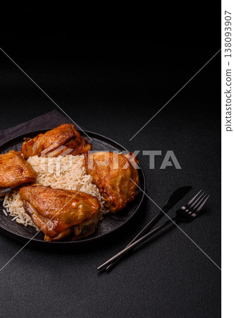 Kabsa or haneeth, an Arabic dish with rice and chicken, salt, and spices. Kabsa or haneeth 138093907