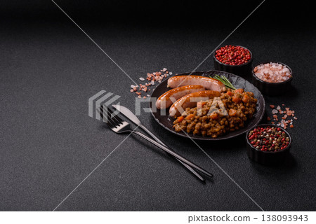 Lentil, carrot, and tomato stew with sausages, a European dish. Lentils with sausages Lentil, carrot, and tomato stew with sausages, a European dish. Lentils with sausages 138093943