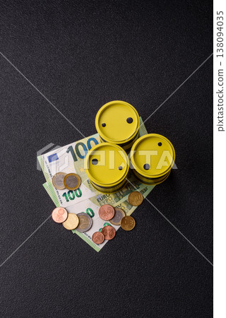 A barrel of oil against a backdrop of euro as a concept for the oil crisis. A barrel of oil A barrel of oil against a backdrop of euro as a concept for the oil crisis. A barrel of oil 138094035
