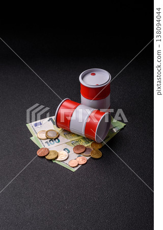 A barrel of oil against a backdrop of euro as a concept for the oil crisis. A barrel of oil A barrel of oil against a backdrop of euro as a concept for the oil crisis. A barrel of oil 138094044