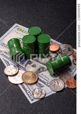 A barrel of oil against a backdrop of dollars as a concept for the oil crisis. A barrel of oil A barrel of oil against a backdrop of dollars as a concept for the oil crisis. A barrel of oil 138094049
