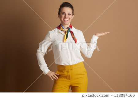 Confident Woman Offering with Open Palm Confident Woman Offering with Open Palm 138094160
