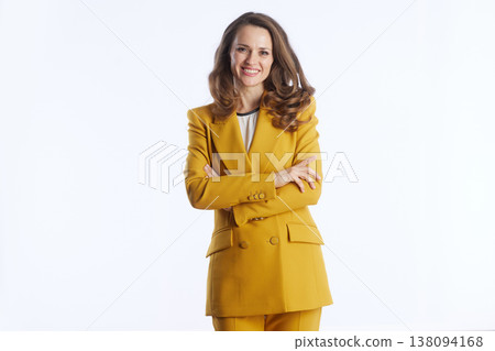 Confident Businesswoman in Yellow Blazer 138094168