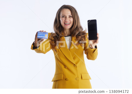 Businesswoman Displaying Credit Card, Smartphone 138094172
