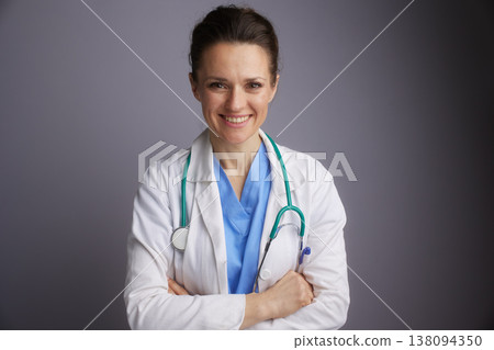 Confident Female Doctor with Crossed Arms 138094350