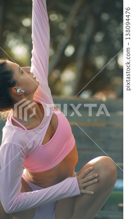 Practicing seated twist to improve movement and strengthen muscles Practicing seated twist to improve movement and strengthen muscles 138094476