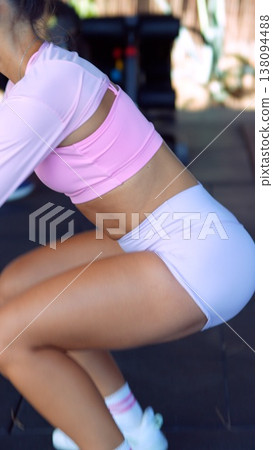 Sports figure emphasizing clothing and stance in lifestyle scene 138094488