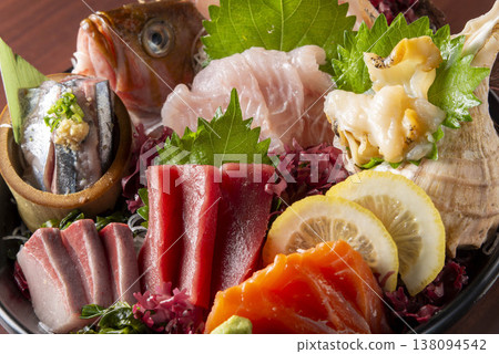 A luxurious assortment of fresh sashimi A luxurious assortment of fresh sashimi 138094542