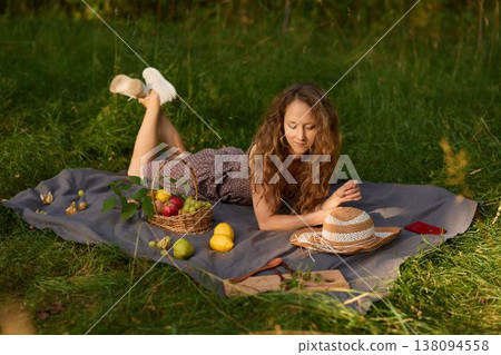 Young woman reclining amid lush natural scenery and calm atmosphere 138094558