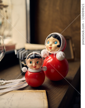 Artisan lacquered matryoshka dolls with warm tones and soft background 138094621