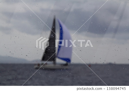Sailboats sail in windy weather in the blue waters of the Aegean Sea, on the shores of the famous holiday destination Bodrum. Sailboats sail in windy weather in the blue waters of the Aegean Sea, on the shores of the famous holiday destination Bodrum. 138094745