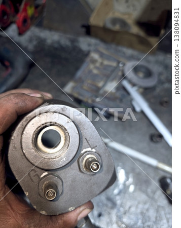 Industrial Igniter Part Showing Components and Design in a Workshop Setting 138094831
