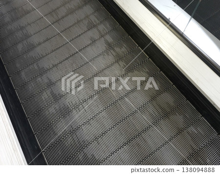 Walking Surface in a Gym With Rows of Moving Strips for Exercise Equipment 138094888