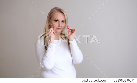 Eye care concept mature woman wearing glasses looking at camera vision health optical wellness lifestyle grey background 138095067