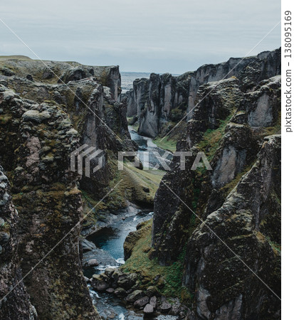 Majestic Fjadrargljufur canyon with a winding river, South Iceland landscape. Majestic Fjadrargljufur canyon with a winding river, South Iceland landscape. 138095169