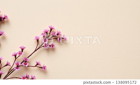 A background image featuring delicate pink flowers on a beige fabric. Natural, feminine, elegant. Suitable for advertising copy space. 138095172
