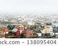 Misty morning over the colorful cityscape of Thorshavn, Faroe Islands. 138095404