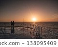 Couple enjoys serene sunset on Faroe Islands ferry deck 138095409