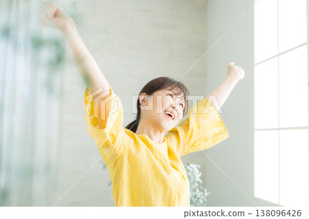 A woman in her 60s by the window 138096426