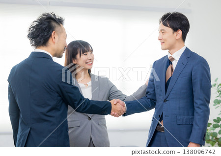 Businessman shaking hands 138096742