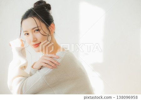 A woman by the window A woman by the window 138096958