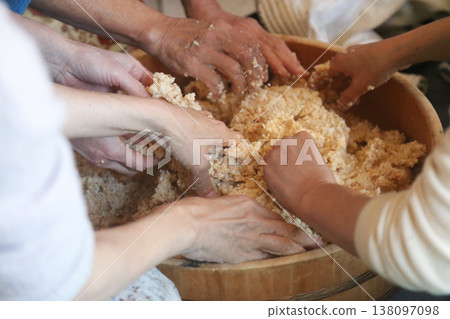 A woman making miso A woman making miso 138097098