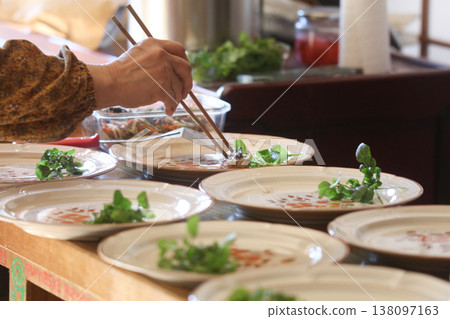 Woman cooking 138097163
