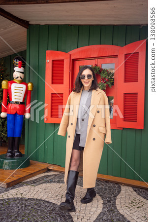 Woman walking sunny winter day European city 138098566