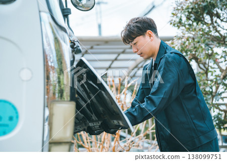 Open the truck's front panel. 138099751
