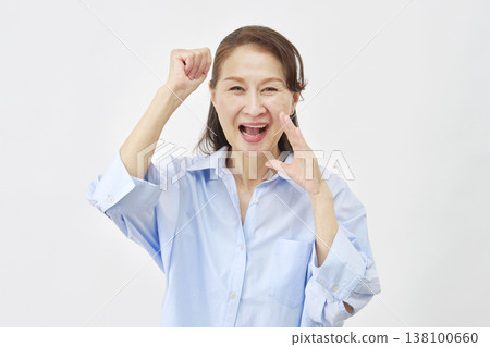 Woman cheering on white background Woman cheering on white background 138100660