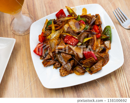 Pork stew with onions, tomatoes and bell peppers. Chinese cuisine Pork stew with onions, tomatoes and bell peppers. Chinese cuisine 138100692