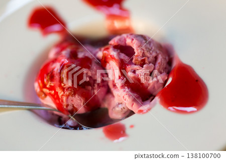Ice cream with berry topping Ice cream with berry topping 138100700