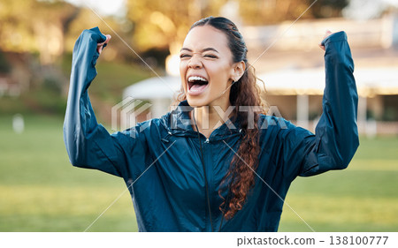 Woman, celebration and winner with excited athlete on a field for sport, game and workout. Training, yes and fitness performance success of a female person with winning and achievement from exercise 138100777