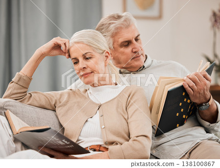 Old couple, relax on sofa and reading book, retirement and support with time together at home. People in living room, knowledge and literature, leisure and hobby with love and comfort with story Old couple, relax on sofa and reading book, retirement and support with time together at home. People in living room, knowledge and literature, leisure and hobby with love and comfort with story 138100867