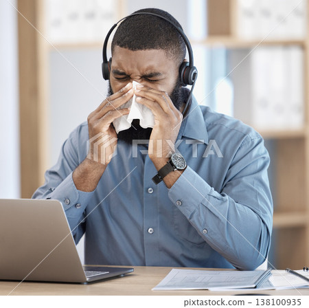 Sick, sneeze and black man with telemarketing, call center and consultant with allergy, professional and customer service. African person, employee and agent with a tissue, tech support and laptop 138100935