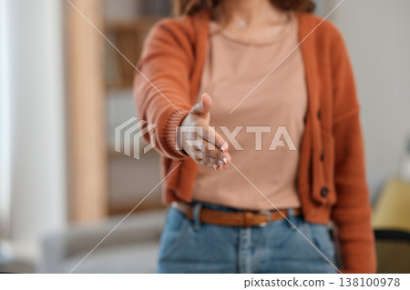Creative woman, handshake and meeting for introduction, welcome or startup partnership at home. Closeup of female person shaking hands for greeting, b2b or deal in agreement, teamwork or thank you Creative woman, handshake and meeting for introduction, welcome or startup partnership at home. Closeup of female person shaking hands for greeting, b2b or deal in agreement, teamwork or thank you 138100978