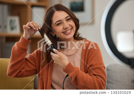 Hair care, curling iron and woman with smile for wellness, beauty treatment and cosmetics on sofa at home. Hairdresser, salon aesthetic and face of person with product for glow and healthy hairstyle Hair care, curling iron and woman with smile for wellness, beauty treatment and cosmetics on sofa at home. Hairdresser, salon aesthetic and face of person with product for glow and healthy hairstyle 138101029