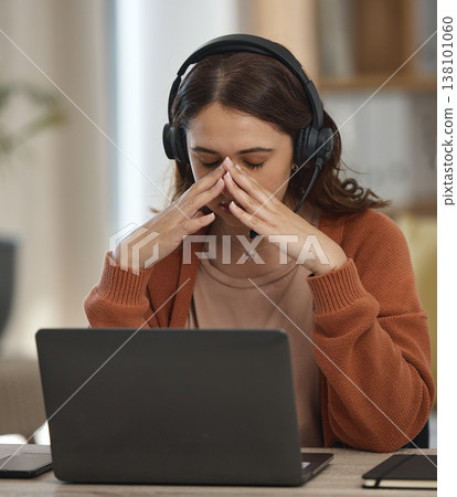 Woman, home and call center stress or headache for telemarketing fail, communication fatigue and sales job. Young worker, telecom agent or virtual consultant with depression, tired or pain on laptop Woman, home and call center stress or headache for telemarketing fail, communication fatigue and sales job. Young worker, telecom agent or virtual consultant with depression, tired or pain on laptop 138101060
