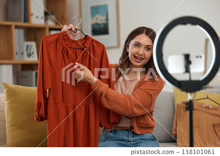 Influencer woman, show clothes and live stream with ring light, review and talking on social media app. Girl, fashion and web chat with presentation, feedback and broadcast with suggestion in home Influencer woman, show clothes and live stream with ring light, review and talking on social media app. Girl, fashion and web chat with presentation, feedback and broadcast with suggestion in home 138101061
