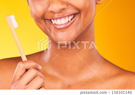 Woman, smile and closeup for dental, toothbrush and teeth for health, happy and hygiene by studio background. Person, treatment and whitening or clean, oral and brushing teeth for wellness in mouth Woman, smile and closeup for dental, toothbrush and teeth for health, happy and hygiene by studio background. Person, treatment and whitening or clean, oral and brushing teeth for wellness in mouth 138101140