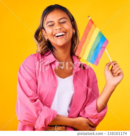 Happy woman, pride and flag with rainbow and LGBTQ community in studio, equality and celebration on yellow background. Freedom to love, support with lesbian or ally, gen z student with gay identity Happy woman, pride and flag with rainbow and LGBTQ community in studio, equality and celebration on yellow background. Freedom to love, support with lesbian or ally, gen z student with gay identity 138101174