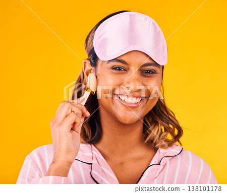 Face roller, morning and portrait of woman with skincare beauty for skin isolated in studio yellow background for dermatology. Facial, detox and young person calm for care and relax with cosmetic Face roller, morning and portrait of woman with skincare beauty for skin isolated in studio yellow background for dermatology. Facial, detox and young person calm for care and relax with cosmetic 138101178