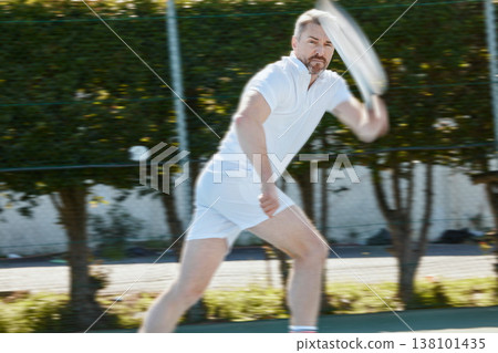 Tennis, running and game with a sports man on a court, playing a match for competition in summer. Racket, ball and hit with a mature athlete outdoor for fitness, training or hobby for recreation 138101435