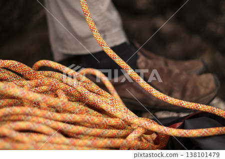 Pile Of Climbing Rope Beside Belayer Pile Of Climbing Rope Beside Belayer 138101479