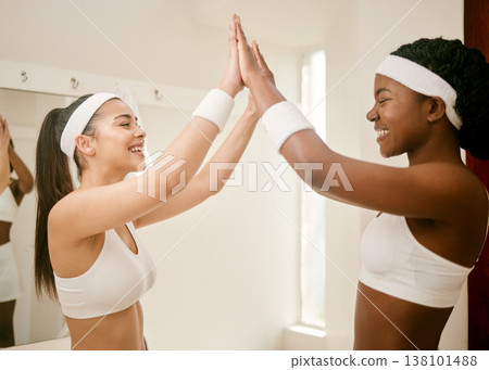 Locker room, fitness and women high five for tennis training, exercise and workout for practice or match. Sports, friends and happy people with celebration for winning, performance and competition Locker room, fitness and women high five for tennis training, exercise and workout for practice or match. Sports, friends and happy people with celebration for winning, performance and competition 138101488