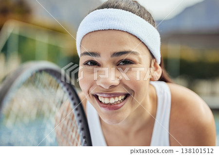 Badminton, portrait and woman tennis player with a racket practicing to play a match at stadium. Fitness, sports and professional female athlete with equipment for training on court for tournament. 138101512
